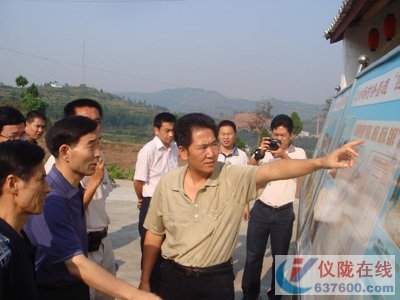 农业部党组成员、驻部纪检组长朱保成来仪调研新农村建设工作