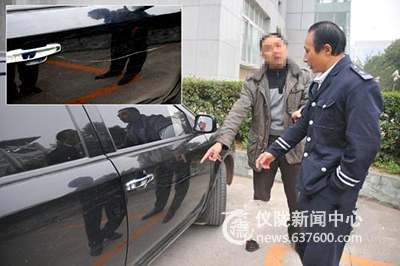 黑色小轿车遭毁容 “凶手”竟然是保安